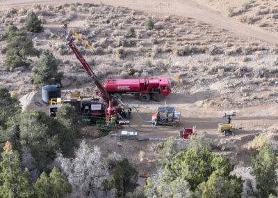Reverse circulation Schramm 450 drill rig in South Dakota, drilling water and monitoring wells to support gold exploration activities.